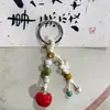 Chaveiro de Bolsa de Cerâmica Tecida à Mão Jingdezhen, Pingente Criativo com Argola de Mola, Presentes Pequenos Culturais e Criativos Atacado