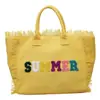 Bolso de lona con letra y borla minimalista para comercio exterior, bolso de mano de gran capacidad, nuevo bolso tote de hombro de color liso para uso transfronterizo