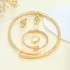 Moda Europea y Americana Simple Metal Pesado Elegante Anillo Geométrico Brillante Gota de Agua Collar Pulsera Pendientes Conjunto de Joyería para Mujeres