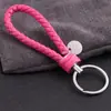Al por Mayor Punto Creativo Cuerda de Cuero Trenzada Círculo Único Llavero Muñeca Bola de Pelo Llavero Accesorios para Llaves Joyería