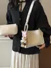 Bolsos de Mujer de Moda Este Año 2026 Nuevos Bolsos de Mano de Nicho Súper Populares con un Toque de Alta Gama Bolsos Versátiles de Hombro y Cruzados