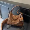Bolso de mano casual simple para mujer, nuevo estilo coreano 2026, bolso de hombro de gran capacidad, bolso cruzado de alta gama para mujer