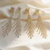 Novos Brincos Longos Transfronteiriços com Corrente de Garra, Espinha de Peixe Totalmente Diamantada, Strass de Floco de Neve, Brincos da Moda Atacado E844