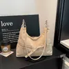 Tendência e versátil nova coleção de 2026 de bolsas de axila de nicho para mulheres, bolsas de ombro estilosas para mulheres, bolsas transversais de ombro de nicho para mulheres
