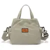 Bolso de Mano Ligero y Compacto para Mujer 2026 Nuevo Modelo Bolso para Viajes Diarios Bolso de Hombro Cruzado Único con Múltiples Bolsillos