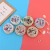 Bolsa para monedas de hojalata Caja de almacenamiento redonda para auriculares Bolsa para monedas Paquete de regalo navideño Fabricante Mayorista