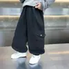Pantalones de trabajo para niños, nuevo estilo primavera y otoño 2026, hasta el tobillo, color liso, pantalones largos casuales elegantes y versátiles para niños