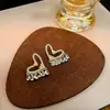 2025 Novos Brincos Coloridos de Asa Brincos de Coração com Diamantes Brincos Geométricos Totalmente Cravejados de Diamantes Fabricante Atacado
