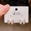 Pendientes de Lazo Blanco Lunar Dinámico de Nueva Generación con Electrólisis Plateada de Color Conservante para Mujer, Estilo Coreano, Pendientes Versátiles de Gama Alta para el Día a Día