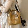 Bolso Pequeño Retro para Mujer Primavera 2026 Nueva Moda Versátil Casual Bolso Cruzado Estilo Coreano Bolso Cubo Popular Este Año