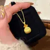 Tienda de Oro Mismo Estilo Diamante Bolsa de la Fortuna Pequeña Collar Arena Antigua Alta Calidad Lujo Ligero Nicho Imitación Oro Colgante Cadena de Lana