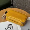 Bolsa de cosméticos de cuero de grano superior con patrón de cocodrilo, estilo nuevo transfronterizo, para mujer, portátil, multifuncional, bolsa de almacenamiento de gran capacidad, bolso de mano de moda