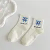 Calcetines para Mujer en Otoño e Invierno Estilo Nuevo Caricatura Cara Sonriente Calcetines de Algodón de Media Pantorrilla para Mujer Son Cómodos, Absorbentes del Sudor, Transpirables y Versátiles para Estilo Campus de Niñas