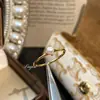 Deseo Transfronterizo Nuevo Estilo Chapado en Oro de 18 Quilates Incrustado con un Anillo de Perla Mini Anillo de Compromiso Europeo y Americano Anillo de Cola para Mujer