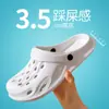 Fabricante Atacadista de Crocs de Dinossauro Sapatos de Jardim Femininos e Masculinos Casal Pai-Filho Sapatos de Praia Sandálias e Chinelos Estilo Coreano Antiderrapante Baotou