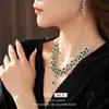 Collar con colgante de girasol con incrustaciones de diamantes, pendiente, todo a juego, cadena para la clavícula de moda de alta gama, lujo ligero, traje vintage de alta gama