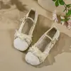 Zapatos de mujer de jacquard estilo chino con una sola tira, modelo nuevo 2026, punta redonda, lazo, perla, boca poco profunda, zapatos planos para combinar con Hanfu