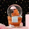 Cartón tarjeta cuero delfín de agua niño bola de cristal brillante caja de música escritorio adornos lindos waterpolo regalos al por mayor