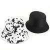 Venta caliente transfronteriza sombrero de pescador de panda de dibujos animados femenino coreano ocio vaca doble cara de ala plana sombrero para el sol al por mayor