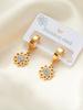 Aretes de acero de titanio de tendencia europea y americana con ojos de luna de flor, multiestilo, personalidad nicho femenina, aretes de acero inoxidable para mujer