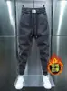 Calças casuais de inverno masculinas estilo coreano calças esportivas da moda com forro de lã calças da moda de nove comprimentos calças elásticas masculinas