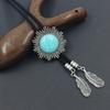 Corbata de Bolo Estilo Indio Grabada con Sol, Cordón Trenzado para Cuello de Turquesa Agrietado con Pluma, Accesorios Transfronterizos Europeos y Americanos
