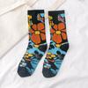 Calcetines para mujer, primavera y verano, nuevos calcetines de tubo medio con dibujos de flores y plantas para mujer, venta al por mayor, calcetines casuales retro de algodón a la moda para mujer.
