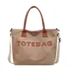 2026 Nuevo Bolso de Hombro Individual Retro con Letras para el Trabajo Gran Capacidad Estilo Bosque Artístico Popular Bolso Cruzado de Hombro Único