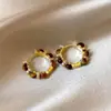 Brincos Olho de Tigre Estilo Melanoid Retro Senso de Design de Nicho Brincos Versáteis Luxo Leve Moda de Alta Qualidade Brincos de Tarraxa para Mulheres