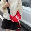 Bolso Cruzado de Lona Casual para Mujer 2025 Nuevo Bolso de Viaje Casual Ligero Almacenamiento Versátil Deportivo Nylon Dumpling Bag