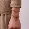 Misterio y Elegancia: Pulsera con Colgante de Oso de Zircón 5A Ins Transfronterizo, Pulsera de Cuentas Redondas, Diseño Simple y de Moda, Elegante Accesorio de Mano de Acero Inoxidable