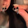 Aretes de mujer más vendidos 2025, nicho de alta gama, temperamento de lujo ligero, aretes de circonita, aretes de aguja de plata 925 al por mayor