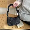 Bolso plisado transfronterizo dulce y elegante, bolso tipo dumpling único y moderno de gran capacidad, bolso de hombro y axila de tela con estampado de estrellas, estrella para el día a día