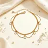 Joyería transfronteriza europea y americana: Tobillera personalizada de doble capa con borlas de ola para mujer, tobillera versátil de cadena fina geométrica con colgante de strass
