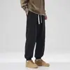 Pantalones casuales tipo jogger negros para hombre, nuevo estilo 2026, holgados y versátiles, pantalones de moda para hombre, nuevos pantalones deportivos elegantes de otoño e invierno
