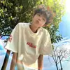 Camiseta de manga curta estilo high street americano com bordado de chama e letras, unissex, corte solto, estilo casal, algodão pesado, top tendência para o verão