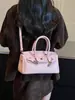 Bolsos retro europeos y americanos para mujer, nuevo bolso de moda Kelly transfronterizo Otoño 2026, bolso cruzado de alta gama, bolso platino