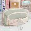 Estuche para lápices de color sólido de gran capacidad con cordón, muy atractivo y lindo, caja de almacenamiento de papelería simple, organizador de papelería estilo ins