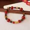 Novo Bracelete de Contas de Ágata Vermelha Natural Estilo Chinês para Mulheres, Design Original de Alta Qualidade com Pedra Olho de Tigre e Pingente Versátil de Cristal da Paz