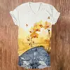 Camisa de mujer con estampado vintage de phalaenopsis amarillo transfronterizo, cuello en V, manga corta, casual, hecha a medida, disponible para venta al por mayor a partir de una pieza