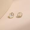 Pendientes asimétricos con forma de corazón y diseño de nicho con placa de incienso de mosquitos, sin orificios para las orejas, para mujer.