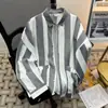 Camisa a rayas verticales de moda, camisa de manga larga para hombre, nuevo estilo de primavera, moda coreana, adecuada para adolescentes