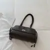 Bolsa vintage de luxo leve de nicho com padrão de diamante para mulheres, novo modelo 2026, bolsa tipo balde de alta qualidade, bolsa de mão para o trabalho, moderna e versátil