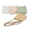 Bolso cubeta tejido de paja simple, elegante modelo nuevo 2026, diseño de nicho minimalista, bolso cubeta tejido de hombro y cruzado