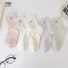 Calcetines para niñas Yishuangshuang, nuevos calcetines de otoño e invierno con forma de corazón de dibujos animados hasta la mitad de la pantorrilla, algodón peinado, calcetines estilo Miu con letras y caras sonrientes para estudiantes