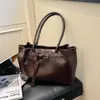 Bolso tote casual vintage para el trabajo y el día a día, nuevo y moderno para principios del otoño de 2026, de gran capacidad, simple, a la moda, bandolera personalizada
