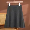 Saia plissada de malha 100% lã, novo estilo de primavera, cintura alta moderna que afina, versão coreana, saia simples e versátil