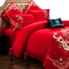 Bordado de algodón de alta gama 140 rojo boda juego de cuatro piezas dote dragón y fénix categoría de cama de algodón al por mayor