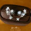 Pendientes asimétricos de aguja de plata y circón con forma de estrella, multi-uso, únicos y de moda, de estilo nicho con un toque de lujo ligero y alta gama