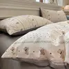 Nuevo juego de cuatro piezas jacquard teñido en hilo de alto peso, estilo simple y fresco, ropa de cama estilo princesa de lujo ligero